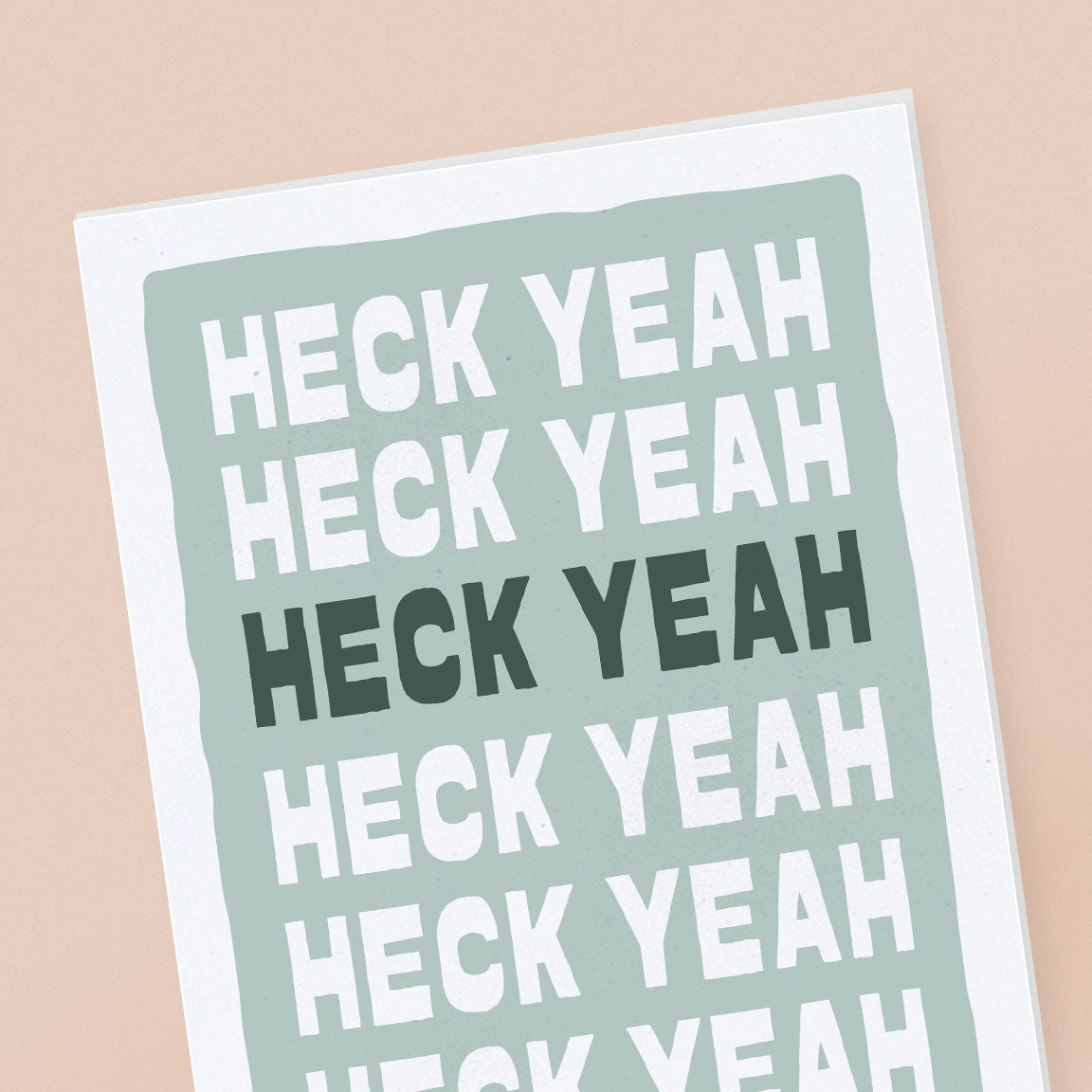 Close up of seafoam card with the words Heck Yeah