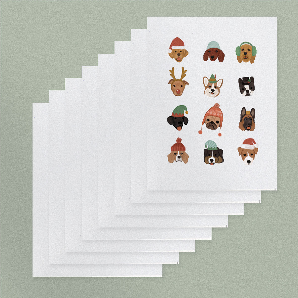Stack of 8 holiday cards featuring dogs in winter hats