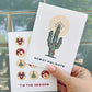Holiday card with lots of Pillsbury Ready-To-Back holiday cookies with the message 'tis the season & a "howdy holidays" saguaro cactus card