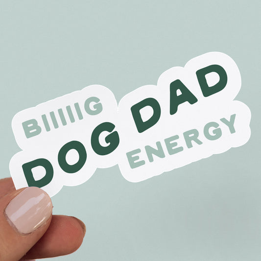 Blue background featuring a sticker saying "Biiiig Dog Dad Energy"