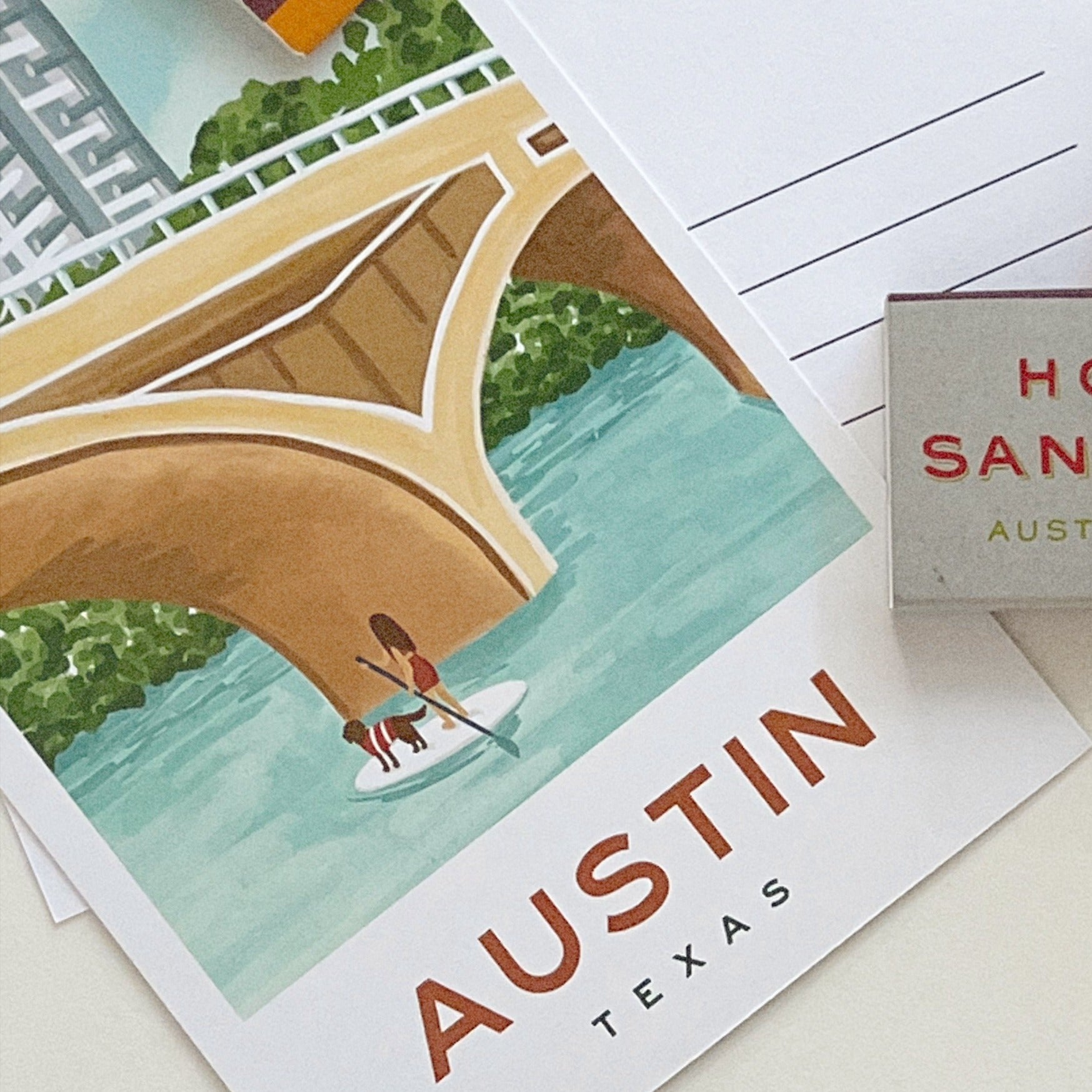 Flat lay of Front & back of Austin Paddle Board Postcard