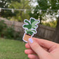 Sticker of a Fiddle Leaf Fig plant in a rattan pot.