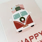 Close-up of pink card depicting a vintage-style van with presents on top and the message "Happy Holidays"