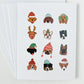 Stack of holiday cards featuring dogs in winter hats