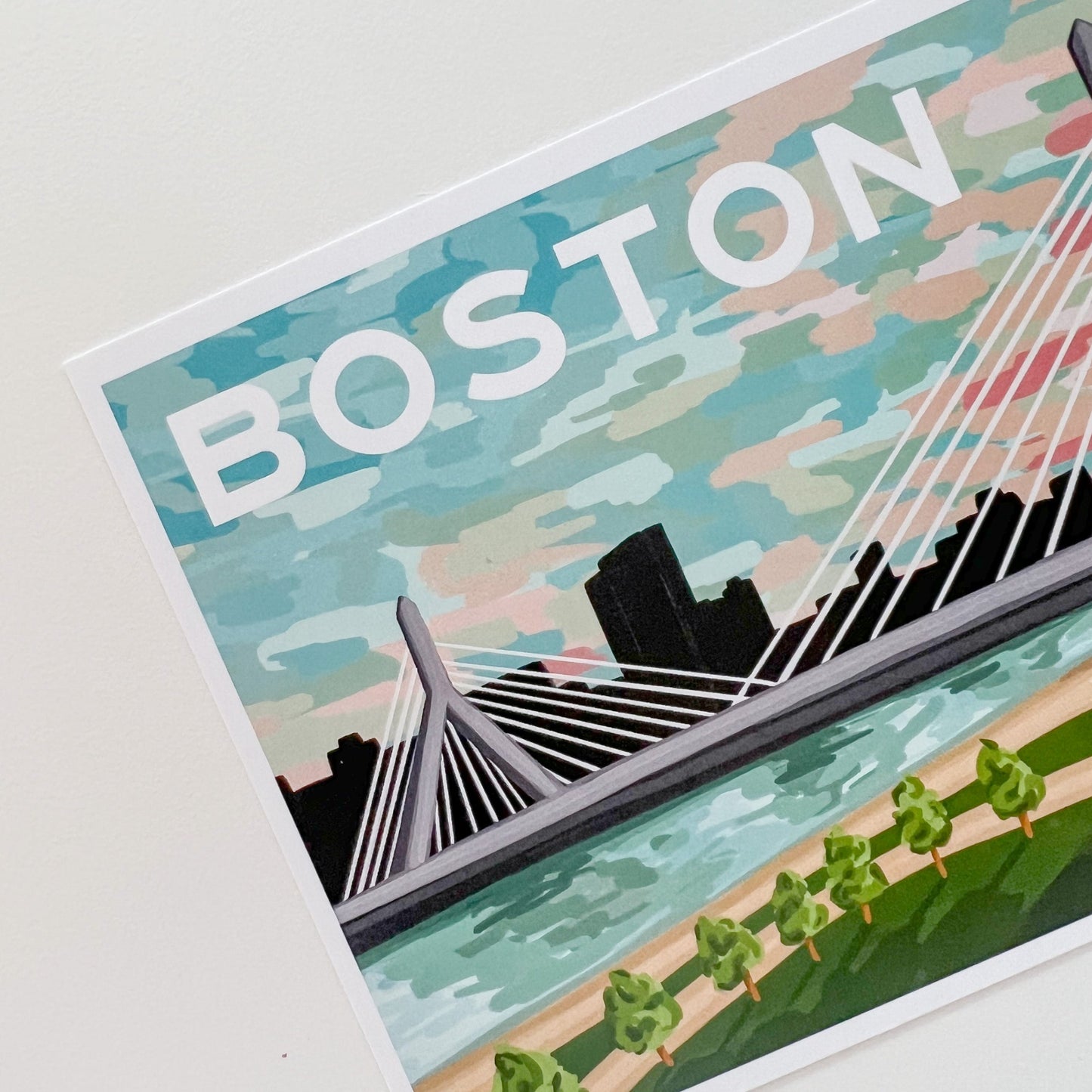 Close up of Boston postcard featuring the Zakim bridge at sunset