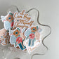 Gold, Sage, Rust, and Peach Flower Vase Stickers paired with "I Can Buy Myself Flowers" Stickers in a bowl