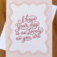 Pink Lovely Day Card on a Rust Fabric Background