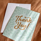 Thank You Card with white envelope shown at an angle.