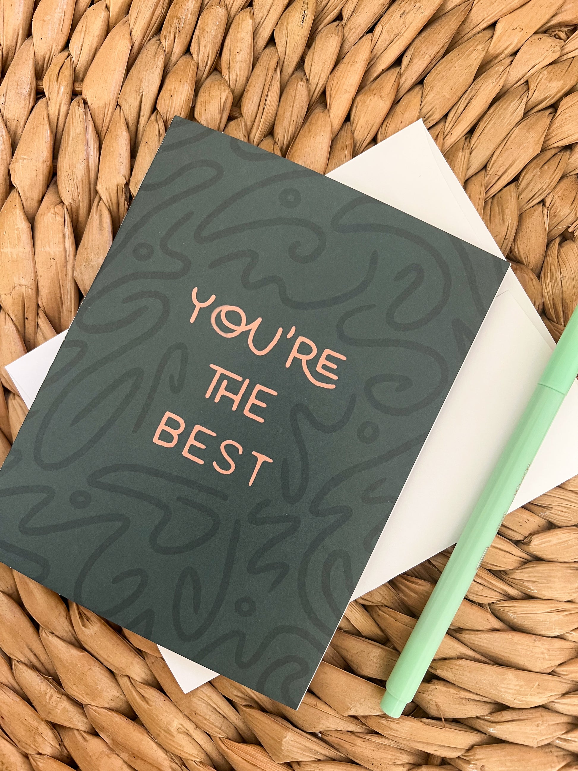 You're The Best Greeting Card with white envelope and green pen.