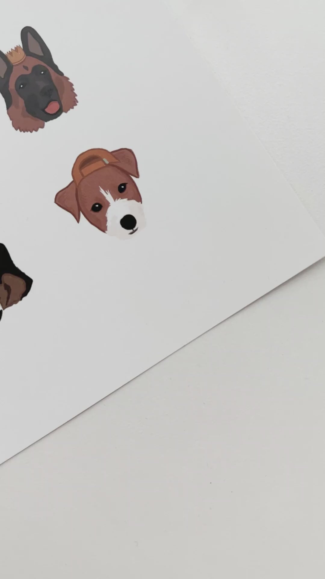 Video panning over Dogs in Hats art print featuring 12 dogs wearing various hats. 